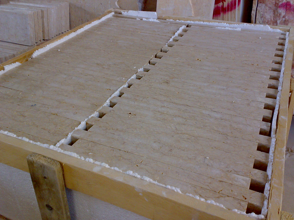 Egyptian marble tiles packed in wooden crates with foam protection – ready for export