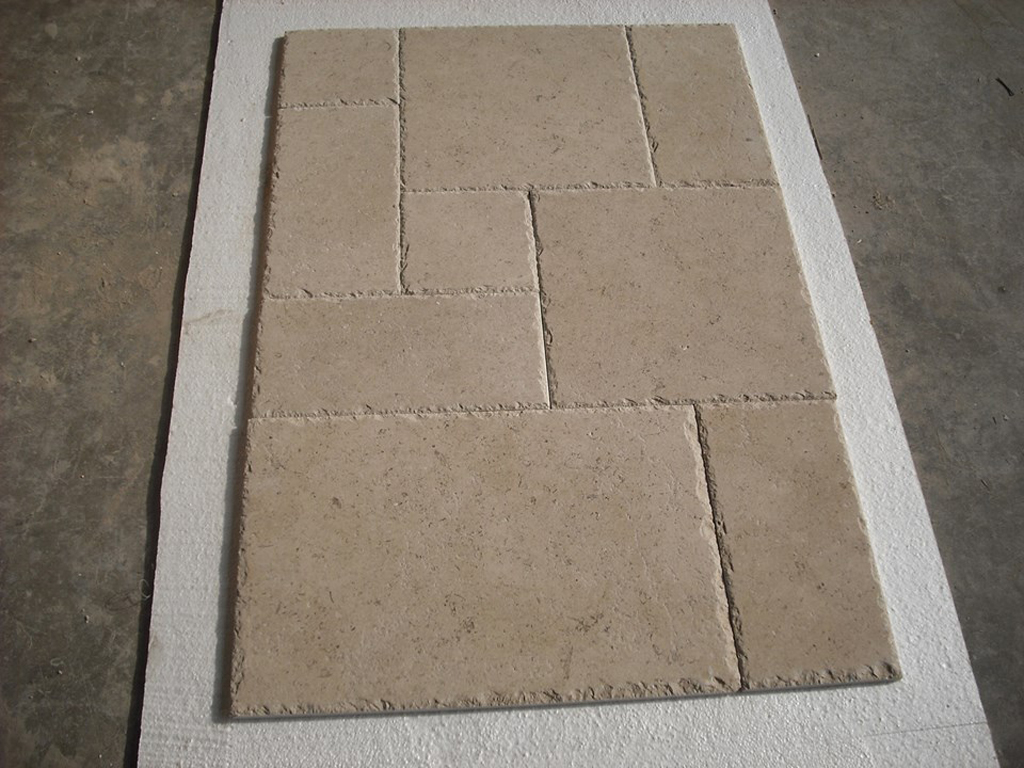 Outdoor patio paved with tumbled Egyptian marble tiles – non-slip rustic flooring